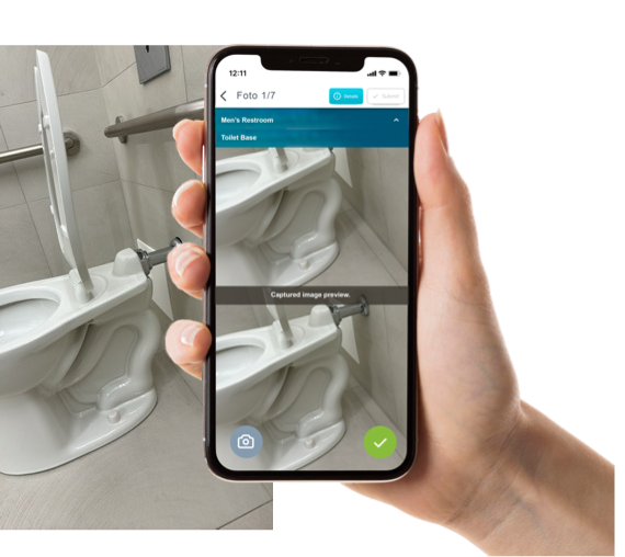 FotoFinish app displayed on a smartphone screen in a commercial restroom setting